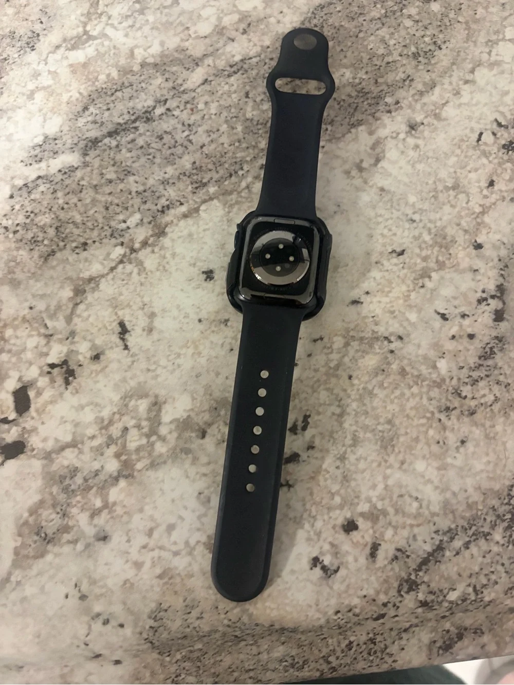 Apple Watch with Black Sport Band and otterbox Case